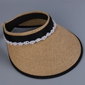 Detailed view of elegant straw sun visor with pearl decoration and black trim - M(56-58cm) / Khaki