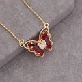 Gold 18K butterfly necklace with large red gemstones and clear zircon accents - Red