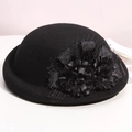 Elegant black wool felt pillbox hat with satin flower bow and mesh veil accessory - Black