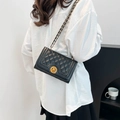 Classic black quilted crossbody bag with gold chain strap and metal twist lock - Black