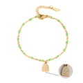 Golden stainless steel Halloween bracelet with green beads and a tombstone charm - Tombstone - Green Beads (XN189-1)