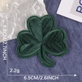 Dark green clover embroidered patch for clothing, dimensions 6.8x6.5cm on denim fabric - 6.8cmx6.5cm