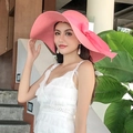 Bright pink wide brim straw sun hat with a matching large bow detail for beach vacations - One Size 55-60cm Adjustable / Pink