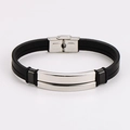Macro shot of black multi-layer leather bracelet with polished stainless steel clasp - Steel