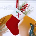 Christmas knit stocking with embroidered letter X on a classic white festive fireplace - Letter X / Red
