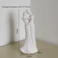Minimalist white ceramic couple sculpture, matte finish, size 24cm height by 10.5cm base - Hugging Style