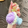 Handmade crochet ice cream keychain with purple and blue yarn and golden bell charm - Purple