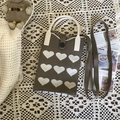 Olive green knitted phone bag with white heart patterns and round top handles - Coffee Heart Black Button