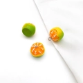 Set of three creative acrylic orange fruit charms for DIY jewelry making and crafts - Peeled Green Orange