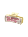 Yellow rectangular hair claw with pink LETS GO GIRLS text and white star patterns - Girls Lets Go Letter