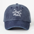 Detail of CAT MOM embroidery and white cat whiskers on washed denim baseball cap - Navy Blue