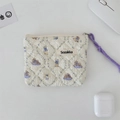 Close-up of floral quilted coin purse with rabbit pattern and purple wrist strap - Lace Purple Rabbit