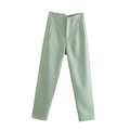 Close-up of light green casual trousers showing high-quality fabric texture and drape - XS / Light Green