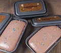 Chocolate squishy toy cake in deep gray box with colorful sprinkles and realistic texture - Chocolate Cake Box
