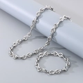 Vista detallada de conjunto de joyas de plata con collar y pulsera de infinito - 10mm de Ancho Color Plata (Pulsera 22cm)