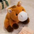 Adorable brown capybara plush toy with soft fur on a cozy blanket for kids and gifts - Pony