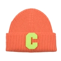 Detail of orange ribbed knit beanie with a bright neon green plush letter C patch - Orange & Yellow