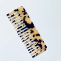 Macro detail of wide tooth acetate hair comb with classic brown tortoiseshell pattern - Large (D#) / Light Leopard (D#)