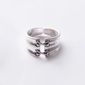 Close-up of silver vintage adjustable ring featuring cross-textured lace design and S925 stamp - Lace-up Cross Style / Adjustable Open