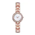 Detailed macro view of rose gold watch with rhinestone bezel and mother of pearl dial - Individual Rose Gold Watch