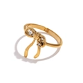Elegante anello a fiocco placcato oro 18K con zirconi scintillanti su sfondo bianco - Anello con fiocco di strass / Oro / US 6