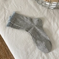 Grey crew socks with light blue ruffled lace trim and embroidered bows - One Size / Gray