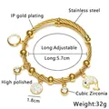 Dettagli tecnici del bracciale a cavo in acciaio da 5,7cm con ciondoli a delfino - Oro