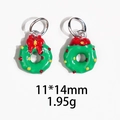 Detail view of green Christmas wreath charms with red bows and silver loops - No.4 - Christmas Wreath / 1 Piece