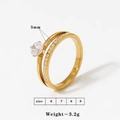 Detailweergave van een 5mm gouden dubbele ring met zirkonia-stenen en maatspecificaties - Maat 7 Gouden Ring (KB089)