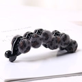 Detail shot of a banana hair clip featuring grey and brown leopard print plush beads - Dark Grey Leopard Banana Clip
