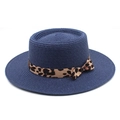Detail of navy blue straw boater hat with stylish leopard print ribbon and side bow - M (56-58cm) / Navy Blue