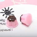 Pink and chocolate resin jelly pudding charms for DIY crafts on a white ceramic plate - Pink Base + Coffee