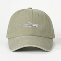 Close-up of detailed shark embroidery on washed olive green cotton baseball cap - One Size / Light Khaki