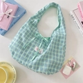 Plaid canvas shoulder bag in blue and yellow check pattern with a cute bow detail - Cyan
