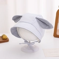 Detail of light blue baby bonnet with soft rabbit ears and striped fabric lining - 46-48cm (6-15 Months) / Light Blue