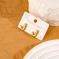 Polished gold stainless steel stud earrings in minimalist J-letter shape for women - Letter J