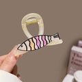 Puppy dog claw clip featuring colorful stripes and a cream acetate fish design hair accessory - Beige Fish