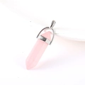 Pink quartz hexagonal crystal pendant with silver metal bail on white background - Rose Quartz