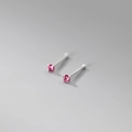 Macro shot of rose pink gemstone earrings with sterling silver four-claw settings - 999 Fine Silver Pair - 2mm Rose Red Zirconia