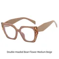 Cat eye glasses frames in cream yellow with tortoiseshell pattern accents on the sides - Tortoise Ends & Beige