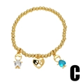 Detail of gold beaded bracelet with zircon boy, girl and heart paw print charms - Rhinestone Boy Paw Girl Style (C)