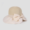 Close-up of wide wavy brim sun hat with large elegant bow detail for summer UV protection - M (56-58cm) / Beige