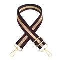 Close-up of adjustable striped handbag strap in burgundy with gold metal buckles - Fuschia
