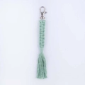 Handwoven light green cotton rope keychain with decorative fringe and metal clasp - Bean Green