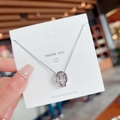 Collana in acciaio al titanio argento lucido con due anelli intrecciati e cristalli - Doppio Anello con Motivo a Vite (X232) / Argento