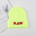 Neon yellow knit beanie featuring bold red RAW embroidery on a cuffed brim style - One Size / Neon Yellow