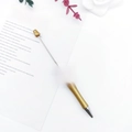 Elegant gold beaded ballpoint pen featuring sparkling rhinestones and metal finish - Glazed Gold