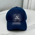 Close-up of navy cotton baseball cap featuring vintage distressed holes and MJ embroidery - One Size (58-60cm) / Navy Blue