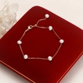 Elegant gold freshwater pearl bracelet displayed on a red velvet jewelry gift box - Freshwater Pearl (White)