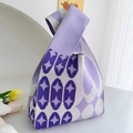 Purple knit handbag with geometric diamond patterns and circular knit textures - Purple-Baby's Breath
